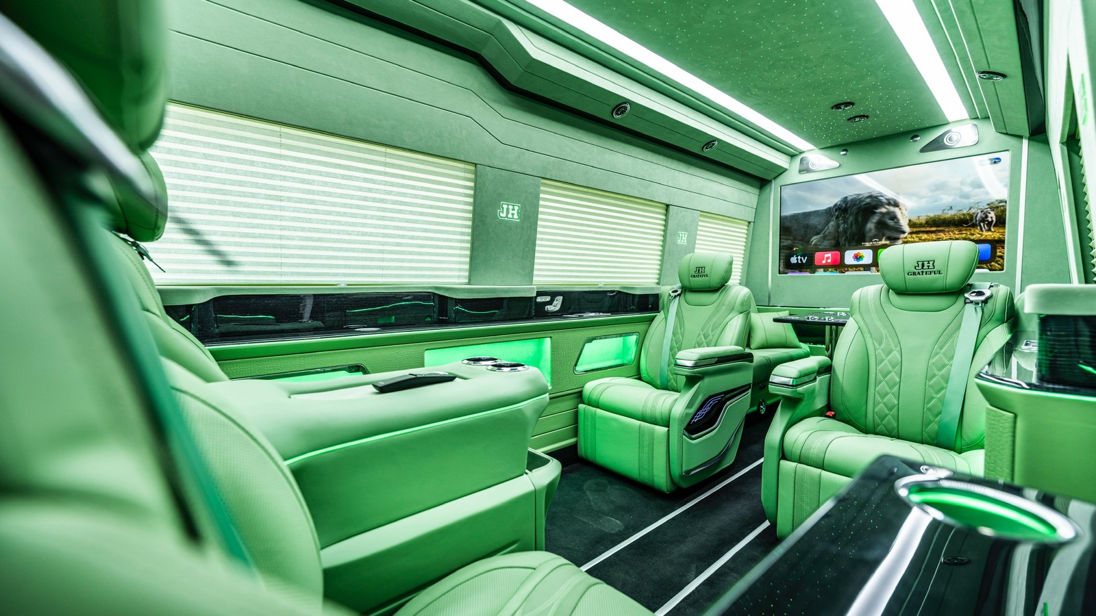 BYJH Anniversary Sprinter interior with green leather seating