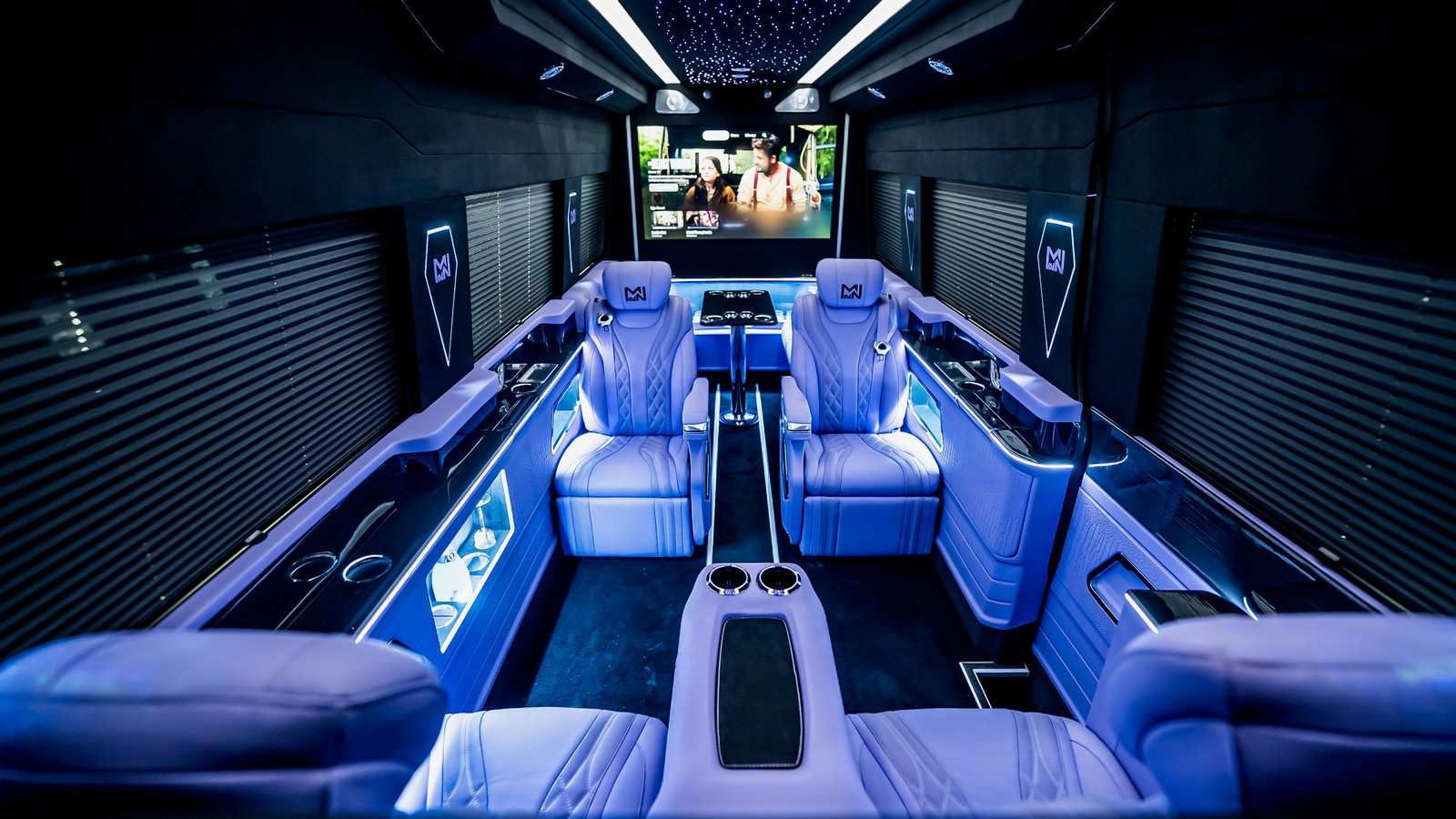 A BYJH custom Sprinter build with quilted seating and a starlight ceiling